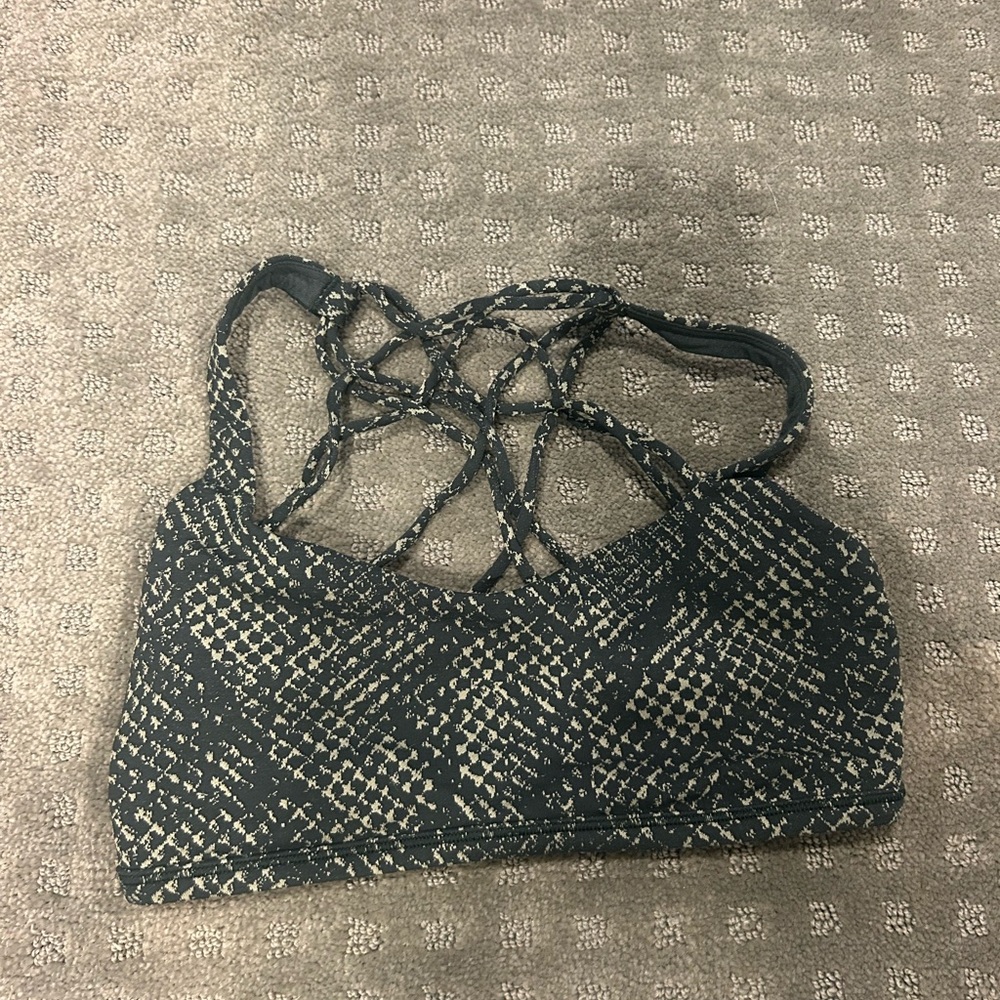 Lululemon Black and Cream Sports Bra with Strappy Design